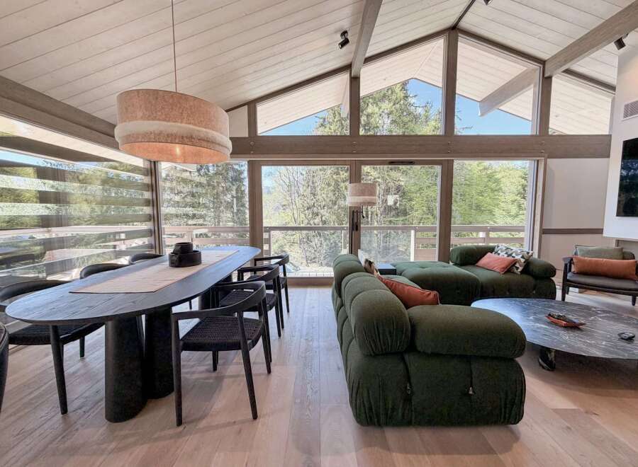 Experience luxury living in this stunning property, featuring a spacious open-plan design with high ceilings and expansive windows that flood the space with natural light.