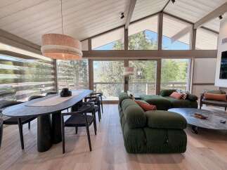 Experience luxury living in this stunning property, featuring a spacious open-plan design with high ceilings and expansive windows that flood the space with natural light.