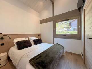 Discover the epitome of comfort and style in this inviting bedroom.