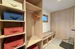Discover the epitome of organized living with this stunning walk-in closet.