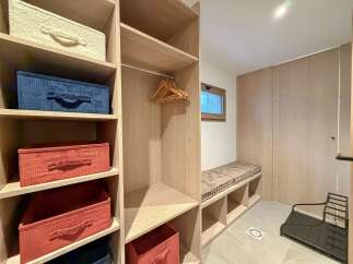 Discover the epitome of organized living with this stunning walk-in closet.