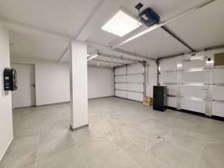 Discover the potential of this spacious garage, perfect for parking or storage.