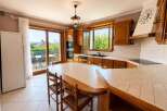 This stunning kitchen boasts a seamless blend of classic design and modern functionality.