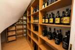 Discover the epitome of luxury and organization with this meticulously designed wine cellar.