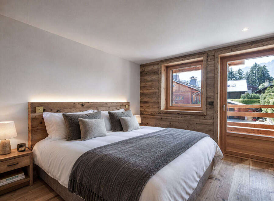 Experience the epitome of rustic elegance in this stunning bedroom.