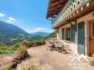 Discover your dream home in the heart of the mountains! This charming property boasts stunning views and a cozy outdoor space perfect for relaxation.