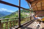 Experience breathtaking mountain views from this charming property.