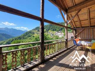 Experience breathtaking mountain views from this charming property.