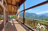 Experience breathtaking mountain views from this stunning property.
