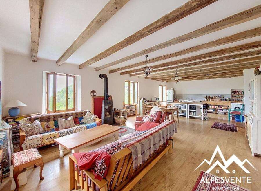 This stunning property boasts a spacious open-plan living area, perfect for entertaining and family gatherings.