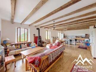 This stunning property boasts a spacious open-plan living area, perfect for entertaining and family gatherings.