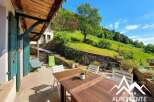 Discover a charming property with stunning views! This home features a beautiful outdoor terrace perfect for enjoying the surrounding natural beauty.