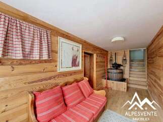 Discover the charm of this cozy chalet, featuring warm wooden interiors and a welcoming atmosphere.