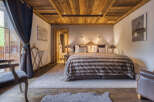Experience luxury and comfort in this stunning bedroom.