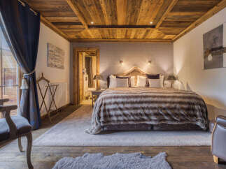 Experience luxury and comfort in this stunning bedroom.