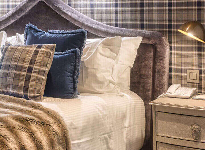 Experience luxury and comfort in this beautifully designed bedroom.