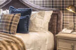 Experience luxury and comfort in this beautifully designed bedroom.