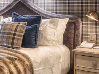 Experience luxury and comfort in this beautifully designed bedroom.