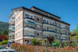 Discover modern living in this stunning apartment building, featuring spacious balconies and contemporary design.