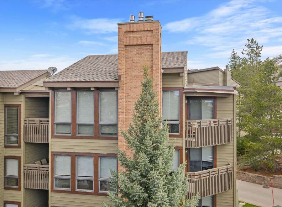 Discover the charm of this stunning property, featuring a beautiful brick chimney and inviting balconies.