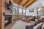 Experience luxury living in this stunning property featuring a cozy fireplace, perfect for chilly evenings.