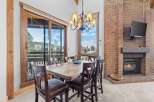This stunning property boasts a cozy dining area, perfect for intimate gatherings.