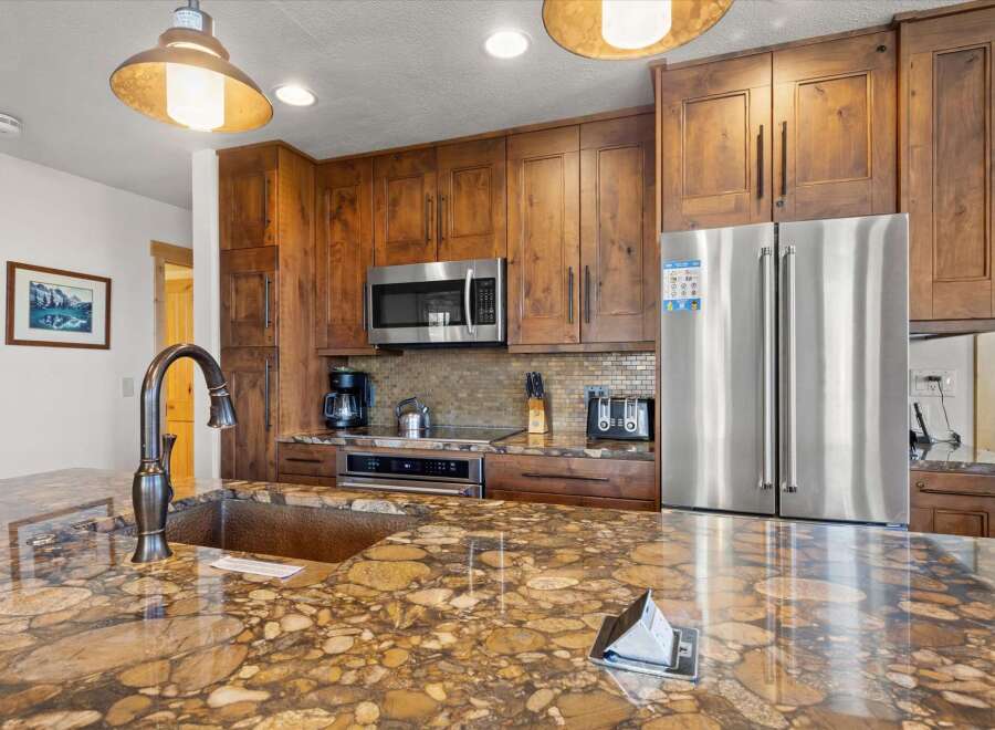 Step into a beautifully designed kitchen, perfect for culinary enthusiasts and entertaining guests.