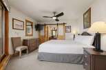 This stunning bedroom boasts a cozy and inviting atmosphere, perfect for relaxation.