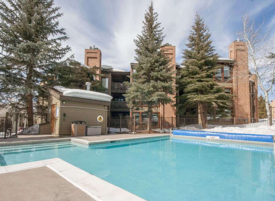 Enjoy the luxury of this stunning property, featuring a refreshing outdoor pool perfect for relaxation and recreation.