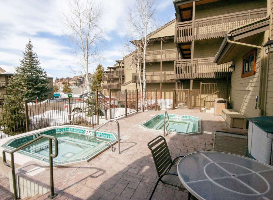 Relax and unwind in this stunning property featuring multiple hot tubs, perfect for enjoying the mountain views.