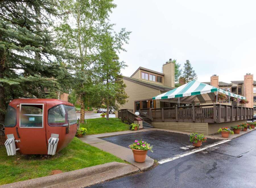 Discover the charm of this property, featuring a unique ski gondola display.
