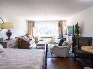 Discover the charm of this inviting living space, perfect for relaxation and entertaining.