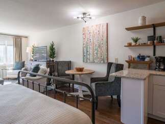 This cozy studio apartment offers a perfect blend of comfort and style.