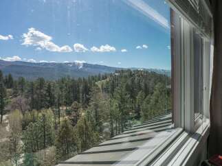 Enjoy breathtaking mountain views from this stunning property.
