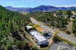 Discover new construction townhomes nestled in a scenic mountain landscape, offering a perfect blend of modern living and natural beauty.