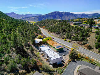 Discover new construction townhomes nestled in a scenic mountain landscape, offering a perfect blend of modern living and natural beauty.