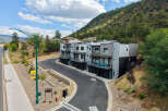 Discover modern living in this stunning townhome community nestled against a scenic hillside.