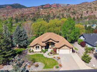 Discover your dream home nestled in a picturesque setting with stunning mountain views.