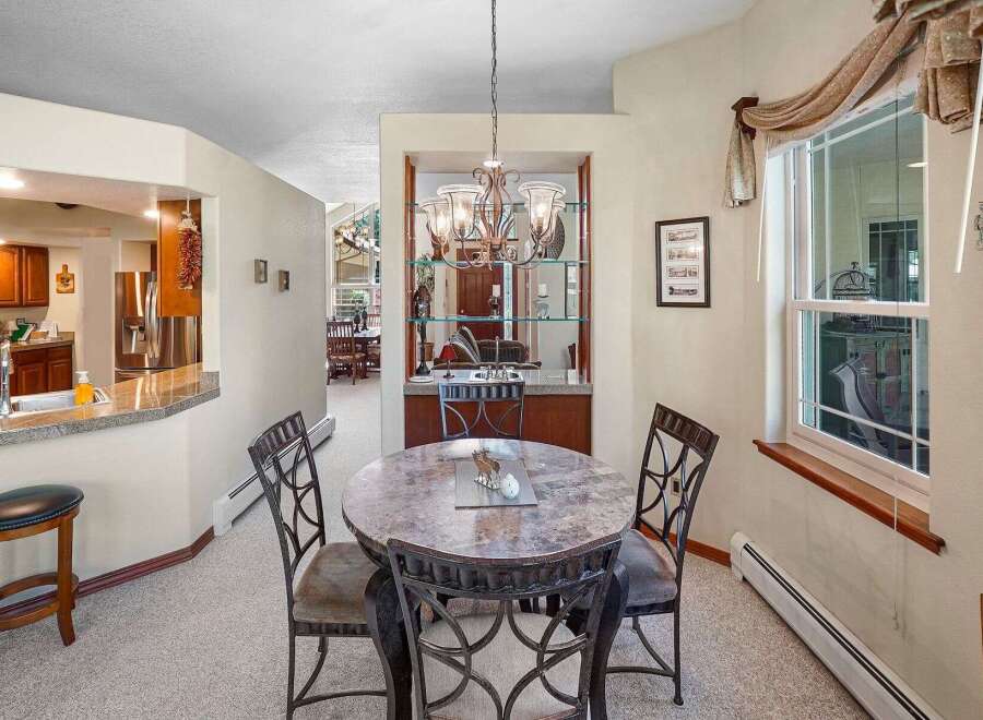 Step into this inviting dining area, perfect for both intimate meals and entertaining guests.