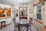 Step into this inviting dining area, perfect for both intimate meals and entertaining guests.