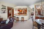 Step into this inviting home featuring a well-appointed kitchen with a breakfast bar, perfect for casual dining and entertaining.