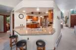 This stunning kitchen boasts a seamless blend of style and functionality, perfect for culinary enthusiasts.