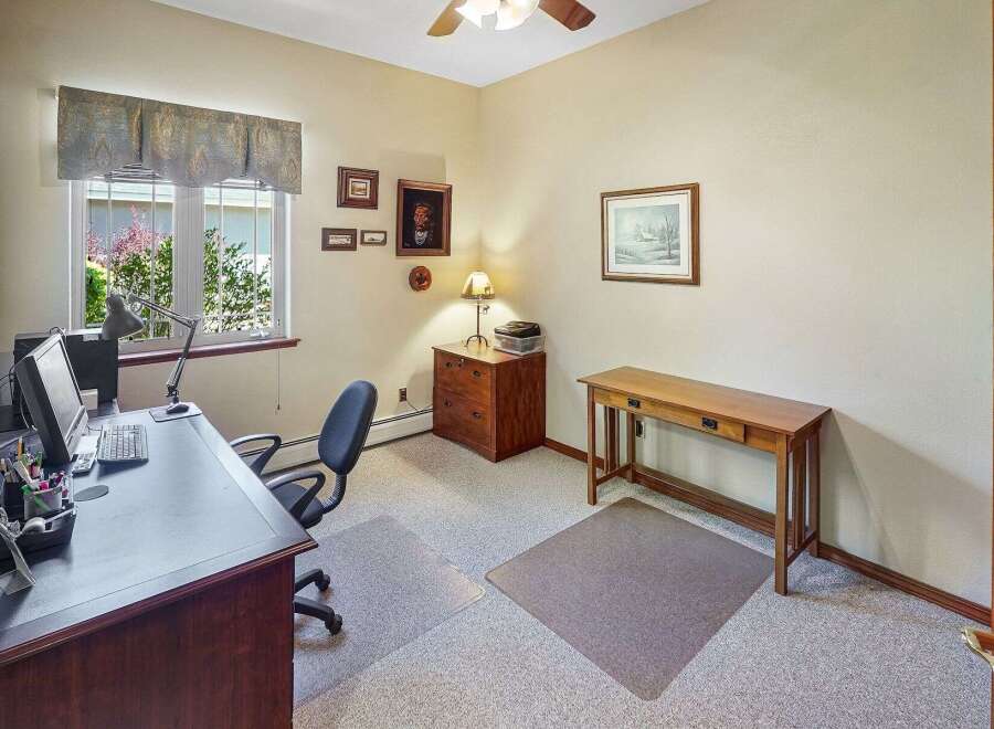 Step into this inviting home office, perfect for productivity and focus.