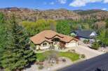 This stunning property boasts a beautifully designed home with a warm, inviting aesthetic.