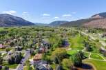 Discover your dream home in this stunning location! This property boasts breathtaking views of a lush golf course, serene river, and majestic mountains.