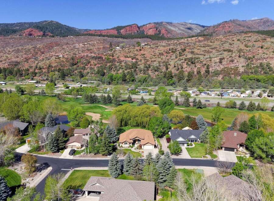 Discover your dream home nestled in a picturesque landscape! This stunning property boasts a beautiful house with a well-maintained yard, perfect for outdoor enjoyment.