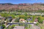 Discover your dream home nestled in a picturesque landscape! This stunning property boasts a beautiful house with a well-maintained yard, perfect for outdoor enjoyment.