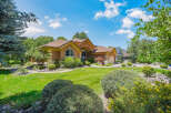 Discover this charming single-family home featuring a warm stucco exterior and a welcoming ambiance.