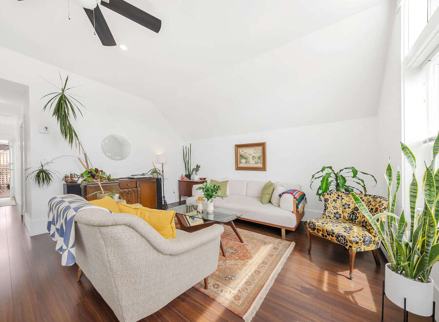 Step into this bright and airy living space, perfect for relaxation and entertaining.