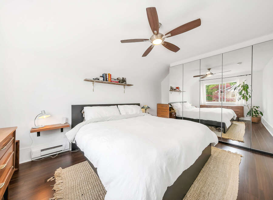This stunning bedroom boasts a modern design with a touch of elegance.